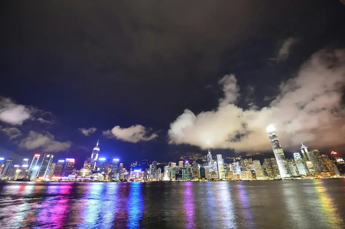 Best eSIM for Hong Kong: Hong Kong skyline illuminated at night over Victoria Harbour