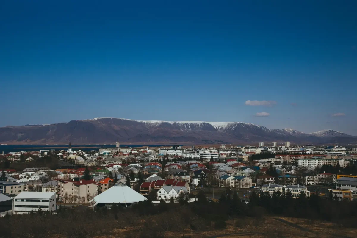 Best eSIM for Iceland: Reykjavik cityscape with mountains in the background