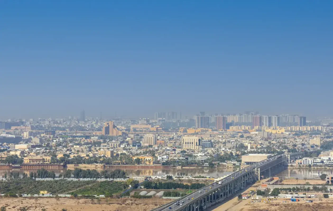 Best eSIM for Iraq: aerial view of Baghdad and the Tigris River